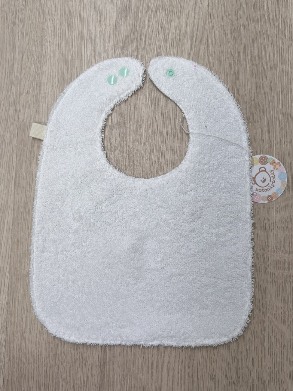 Bavaglino svezzamento cerato con retro in spugna - grafiche NotOnlyTeddy Bacchette magiche verde