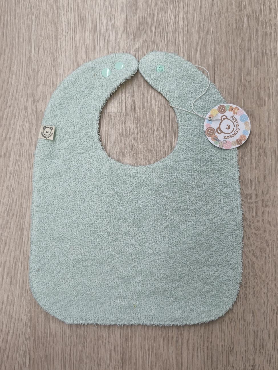 Bavaglino svezzamento cerato con retro in spugna - grafiche NotOnlyTeddy Bacchette magiche verde