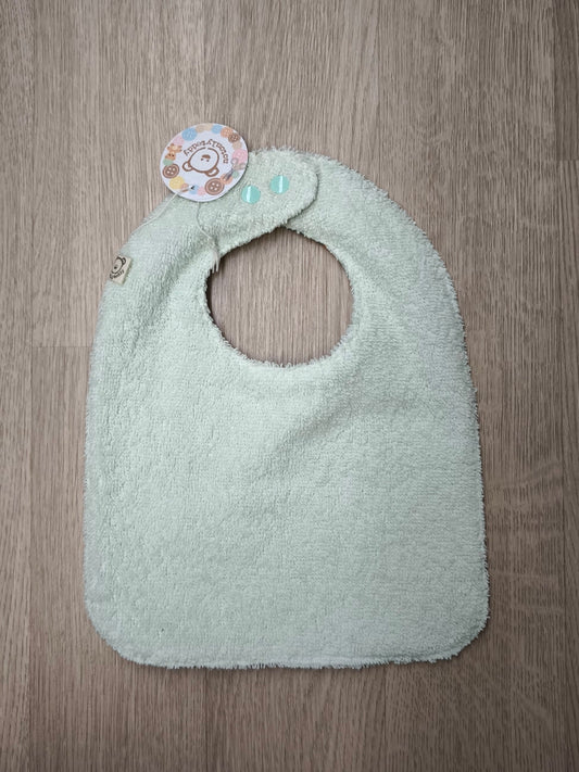 retro in spugna verde chiaro di bavaglino cerato con fantasia di volpine