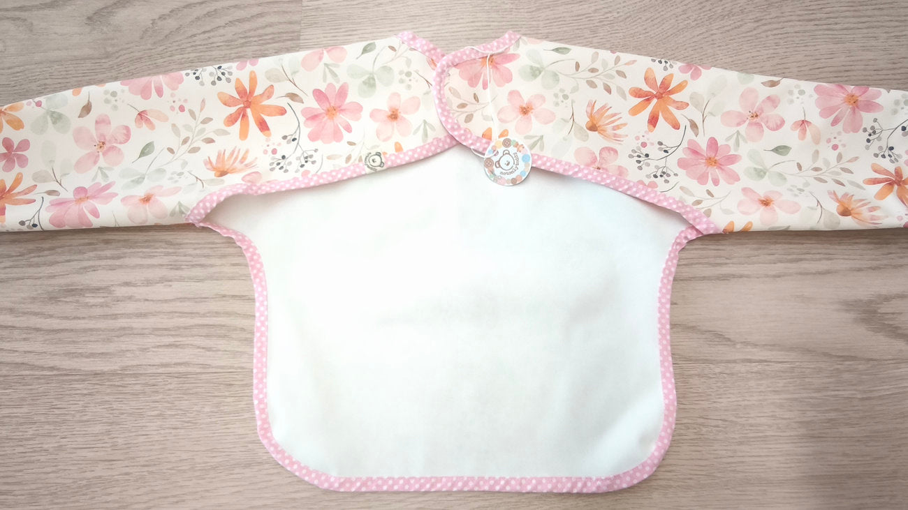 Bavaglino cerato con maniche - fantasia fiori