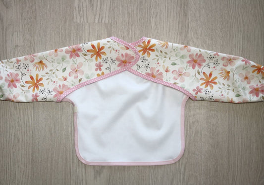 Bavaglino cerato con maniche - fantasia fiori