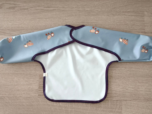 Bavaglino cerato con maniche - fantasia camioncini betoniera