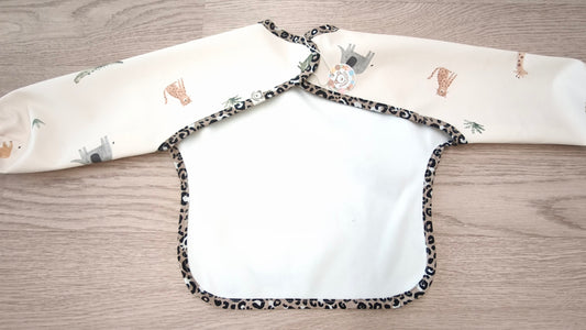 Bavaglino cerato con maniche - fantasia animaletti della savana