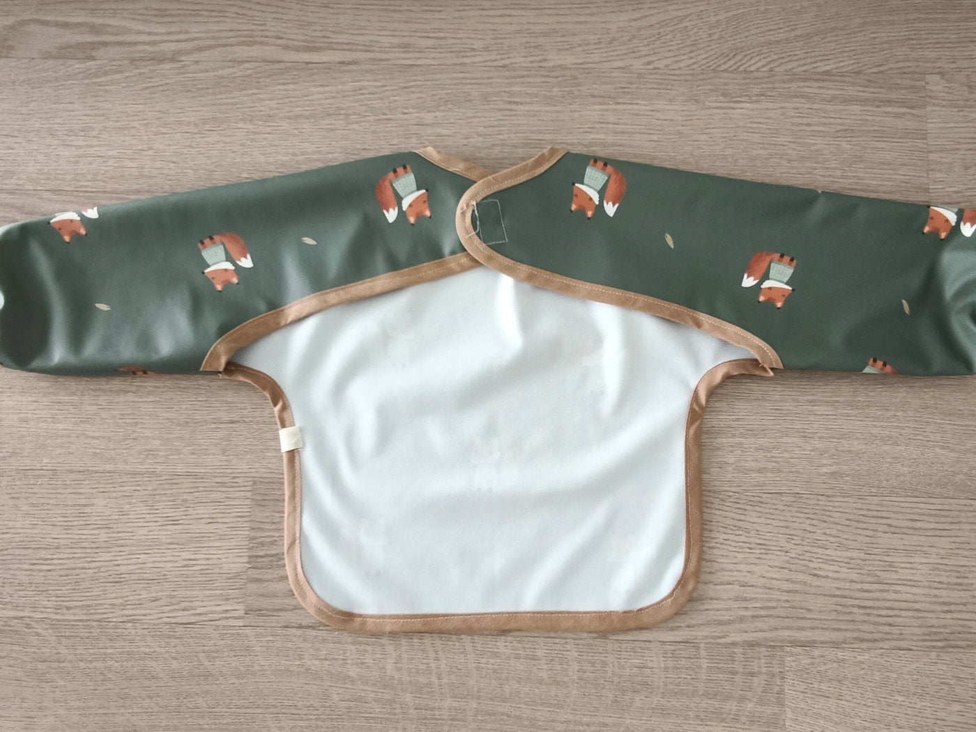Bavaglino cerato con maniche - volpine