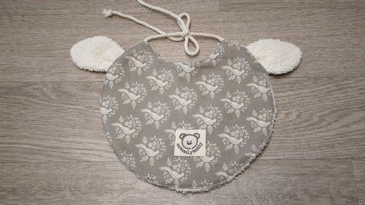 retro di bavaglino a forma di musetto di agnellino avorio