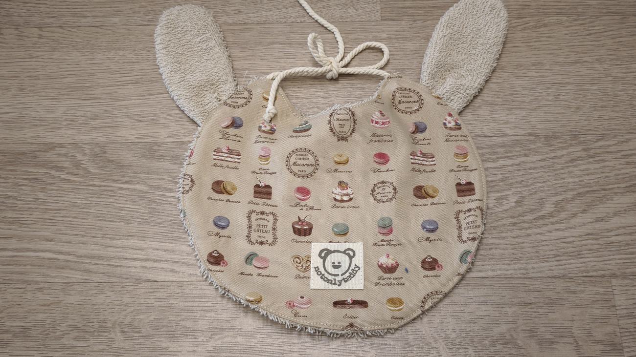 retro di bavaglino a forma di musetto di coniglietto beige