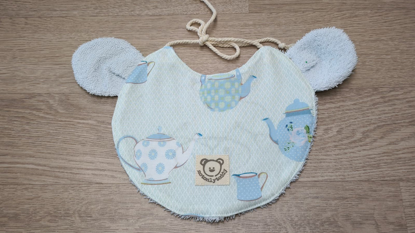 retro di bavaglino a forma di musetto di orso azzurro
