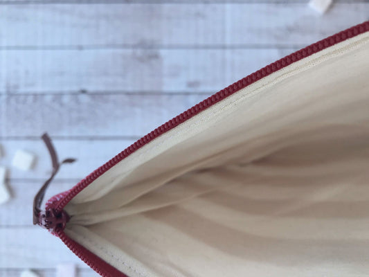 Busta mare a righe bianche e rosse con manichetto ed applicazione di cavalluccio marino