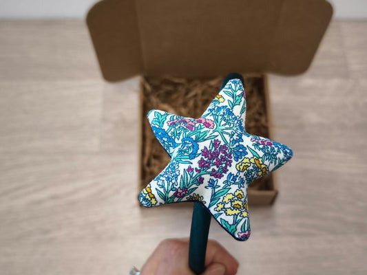 Cerchiello in raso blu con stellina a fiori