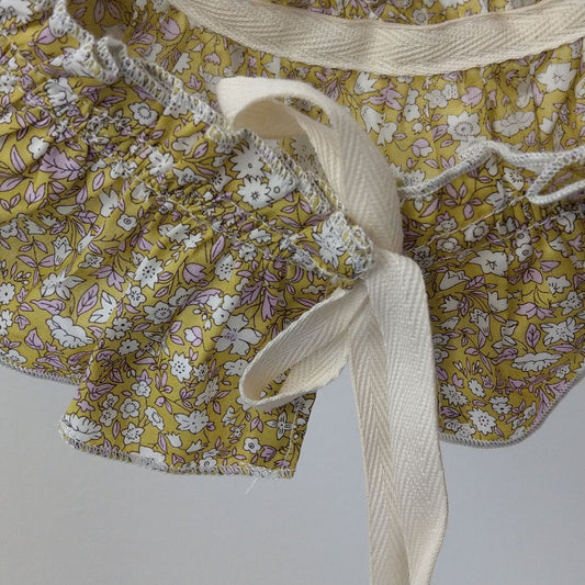 Colletto per bambina in tessuto Liberty a fiorellini con fiocchetto