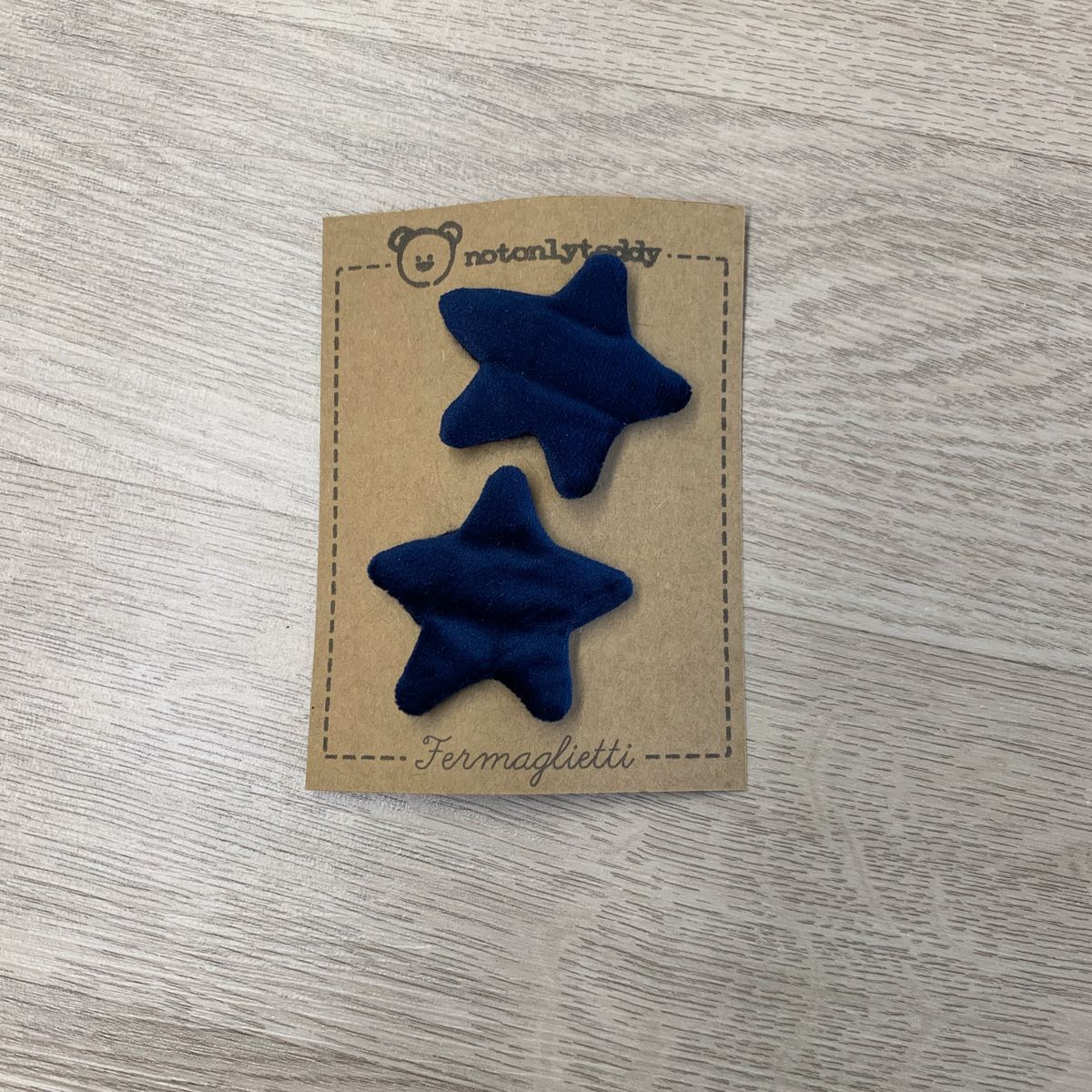 fermaglietti piccoli a forma di stellina in velluto blu