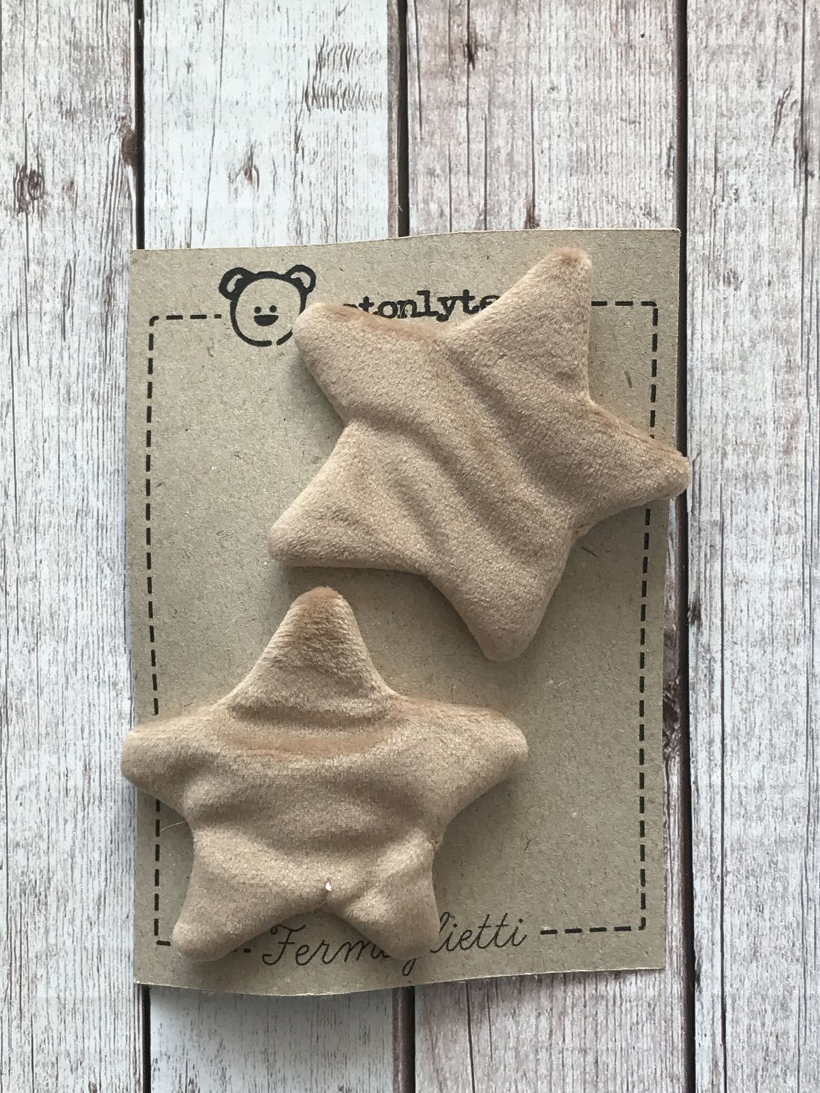 fermaglietti a forma di stellina in velluto beige