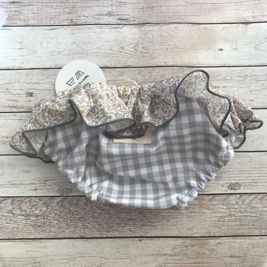 Retro di costumino bambina con volant quadretti grigi e fiorellini