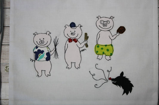 Zainetto semplice in tessuto con ricamo: 3 Porcellini – dettaglio ricamo