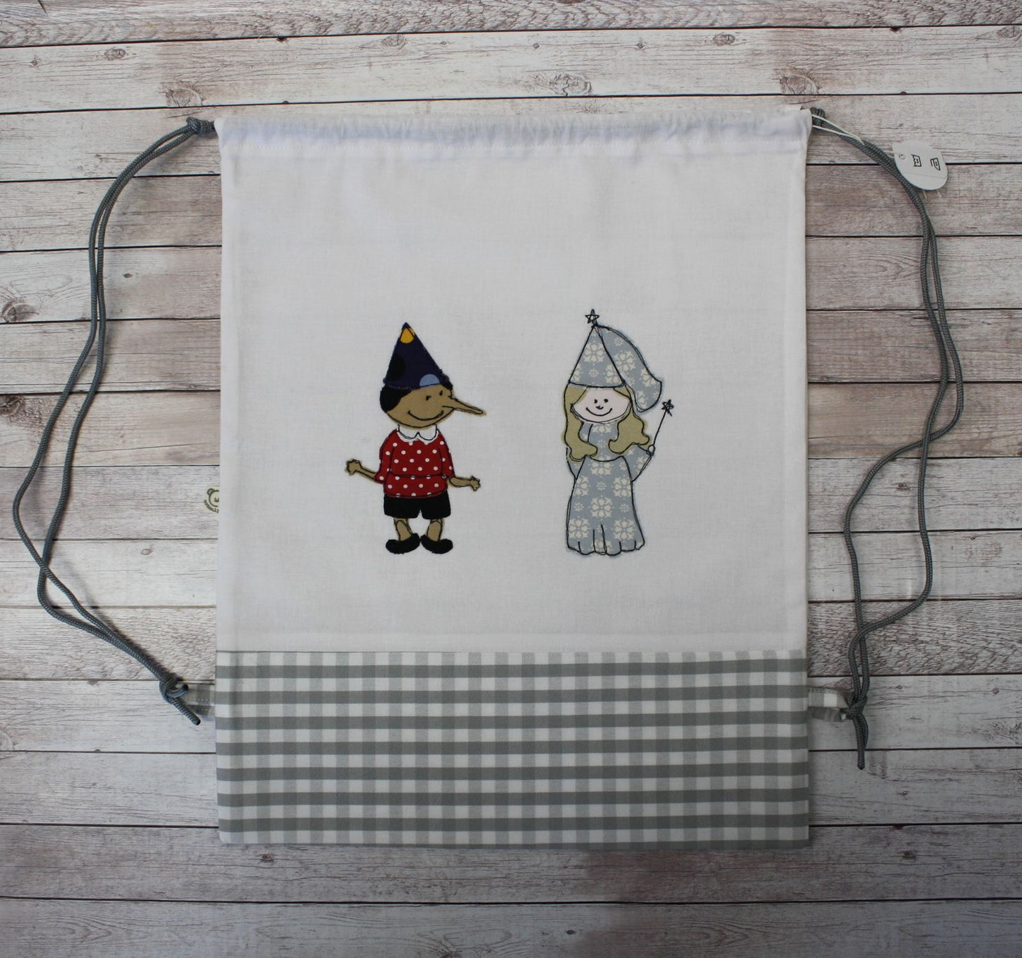 Zainetto semplice in tessuto con ricamo: Pinocchio