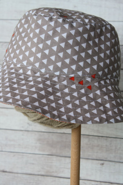 Cappellino parasole double-face, arancione e beige - taglia 3-5 a