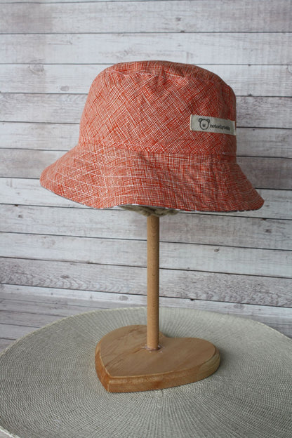 Cappellino parasole double-face, arancione e beige - taglia 3-5 a