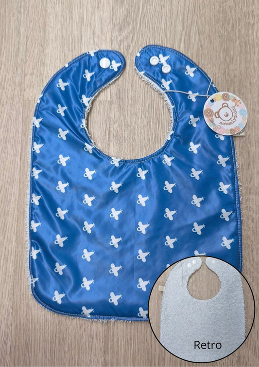 Bavaglino svezzamento cerato blu con retro in spugna - grafiche NotOnlyTeddy aeroplanini