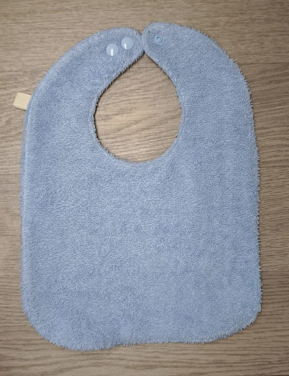 Bavaglino cerato azzurro con animaletti baby - retro in spugna azzurra