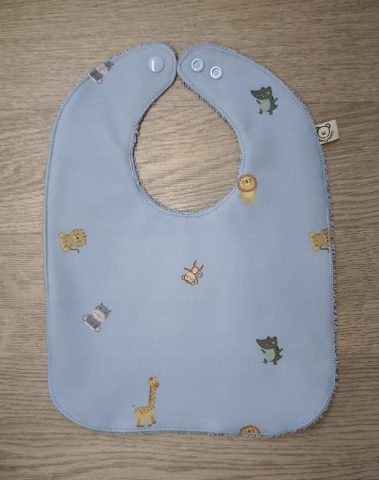 Bavaglino cerato azzurro con animaletti baby - retro in spugna azzurra