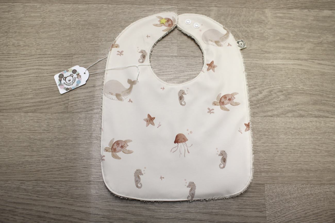 Bavaglino cerato con animaletti marini 🐙🐚🐳- retro in spugna