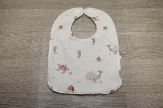 Bavaglino cerato con animaletti marini 🐙🐚🐳- retro in spugna