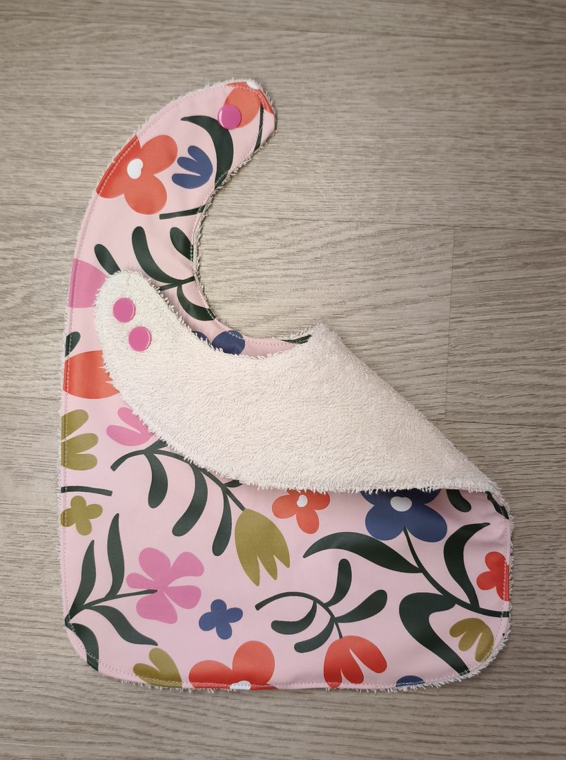 Bavaglino cerato con fiori grandi - retro in spugna