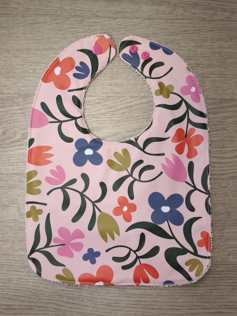 Bavaglino cerato con fiori grandi - retro in spugna