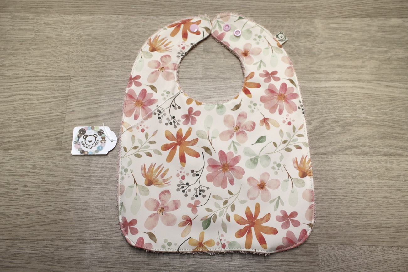 Bavaglino cerato con fiori - retro in spugna