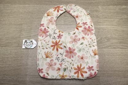 Bavaglino cerato con fiori - retro in spugna