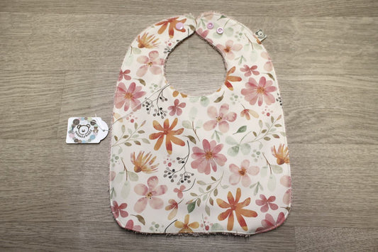 Bavaglino cerato con fiori - retro in spugna