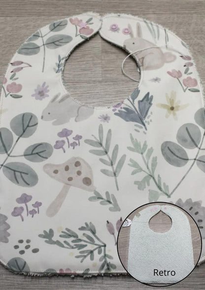 Bavaglino cerato con animaletti e piante - retro in spugna