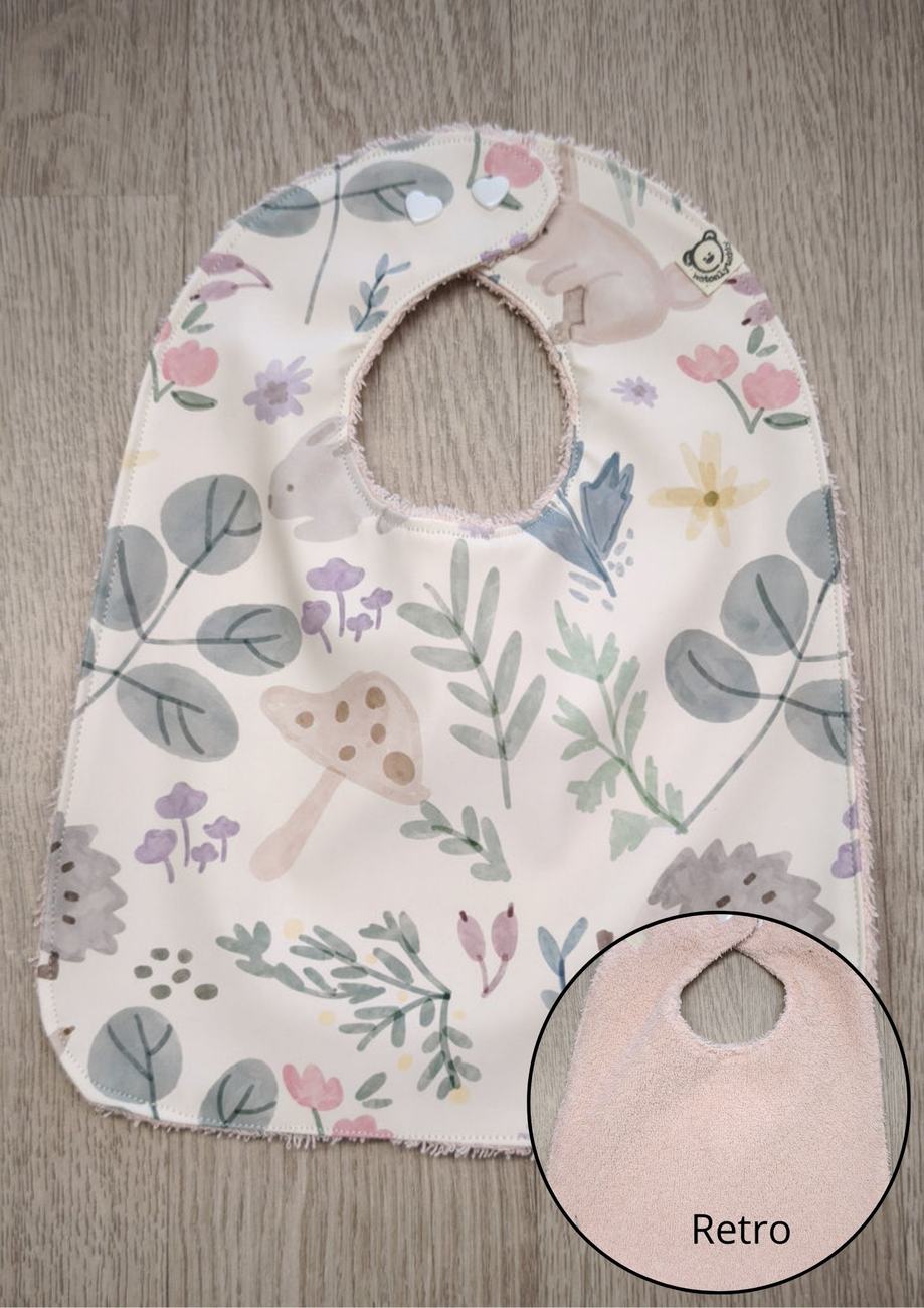 Bavaglino cerato con animaletti e piante - retro in spugna