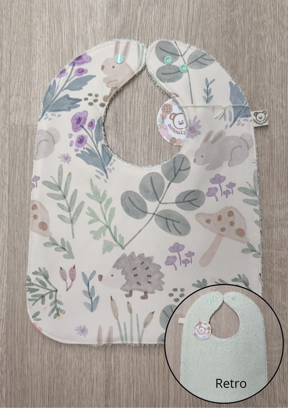 Bavaglino cerato con animaletti e piante - retro in spugna
