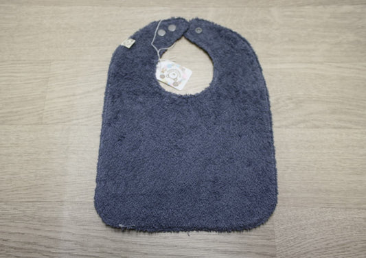 Bavaglino cerato azzurro con camioncini - retro in spugna