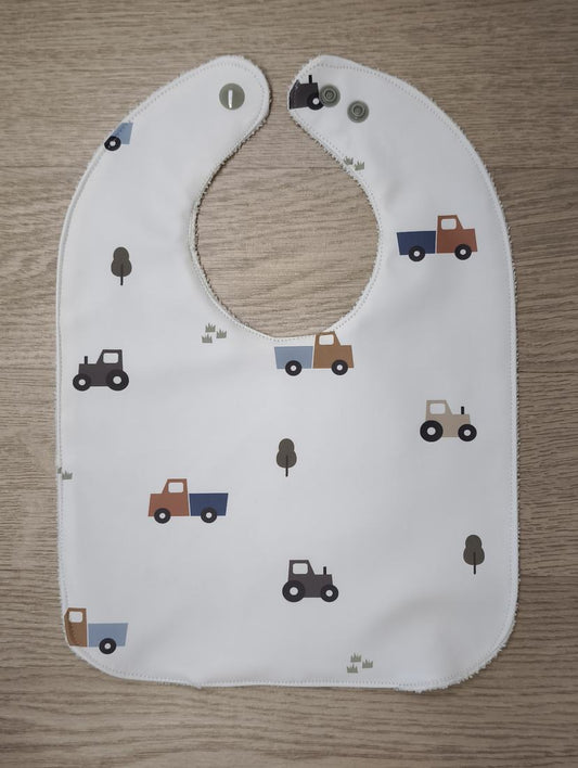 Bavaglino cerato bianco con furgoncini - retro in spugna bianca