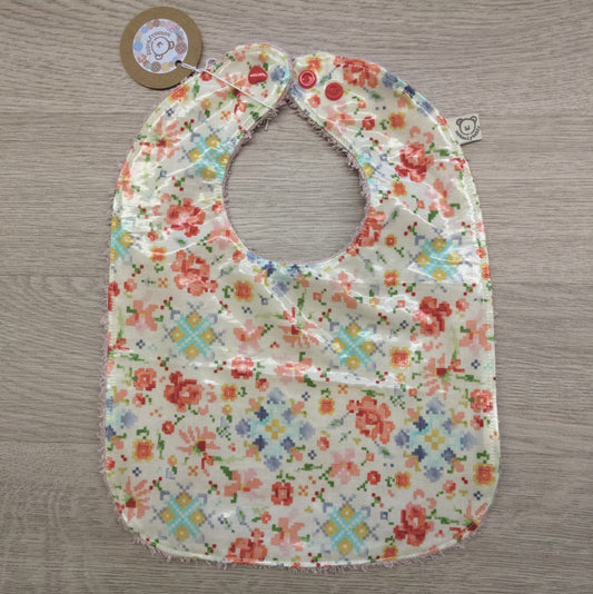 Bavaglino cerato con grafica a fiori pixelati - retro in spugna