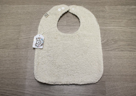 Bavaglino cerato con animaletti della savana su beige - retro in spugna
