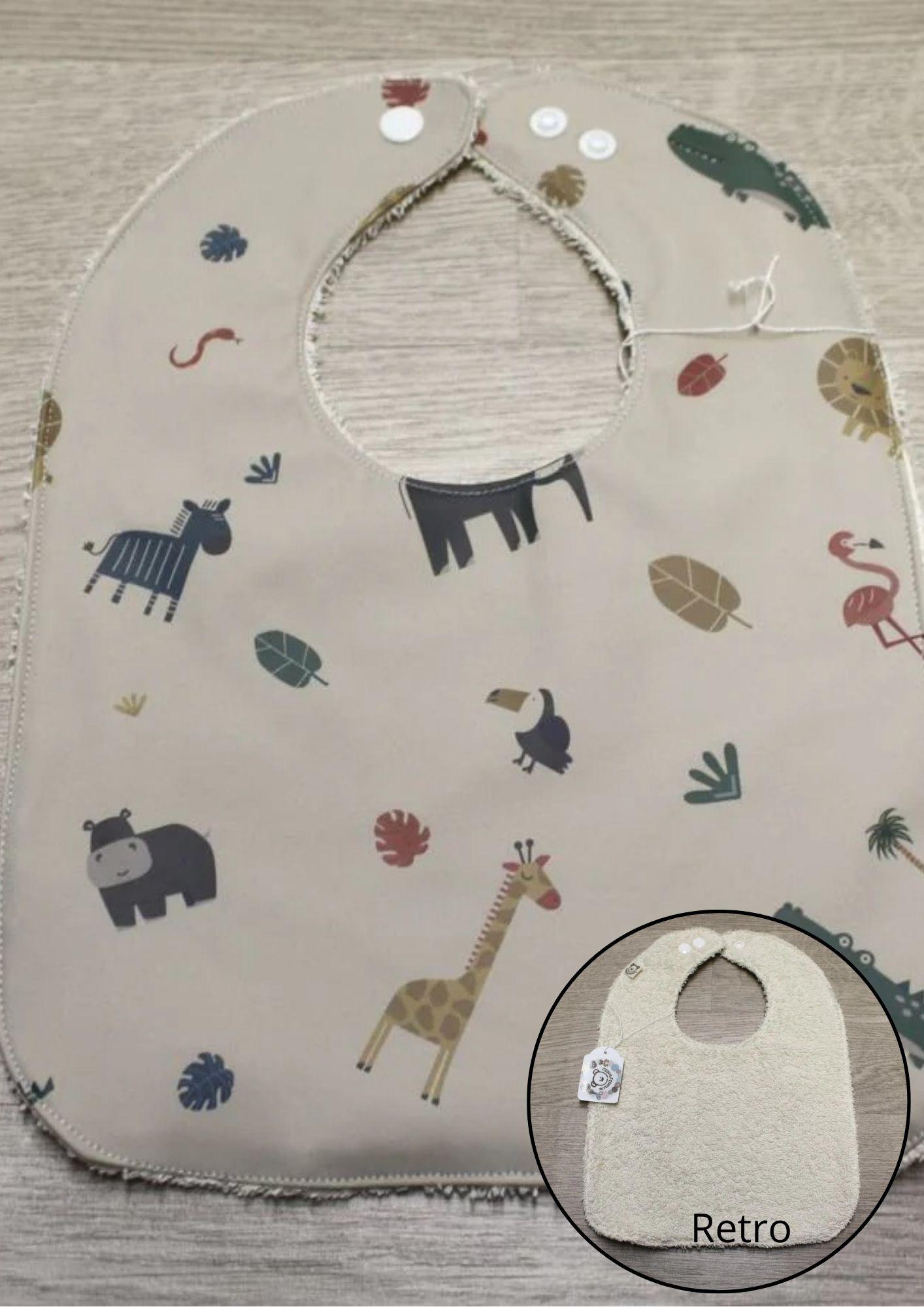 Bavaglino cerato con animaletti della savana su beige - retro in spugna