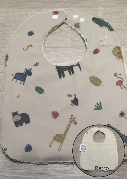 Bavaglino cerato con animaletti della savana su beige - retro in spugna