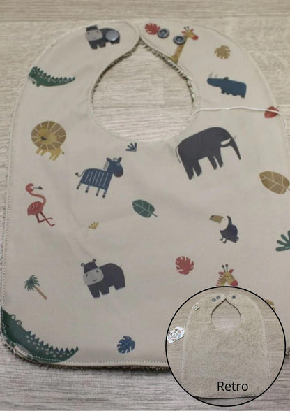 Bavaglino cerato con animaletti della savana su beige - retro in spugna