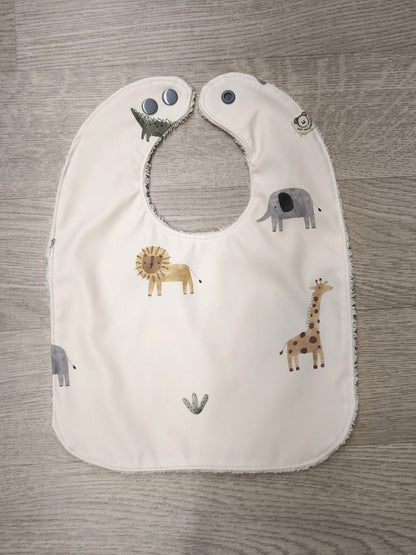 Bavaglino cerato con animaletti della savana - retro in spugna