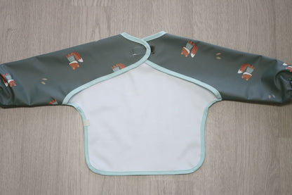 Bavaglino cerato con maniche - volpine