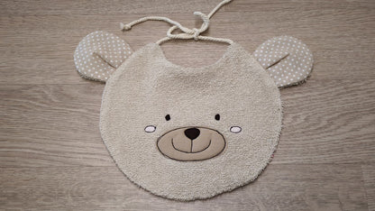 bavaglino a forma di musetto di orso beige