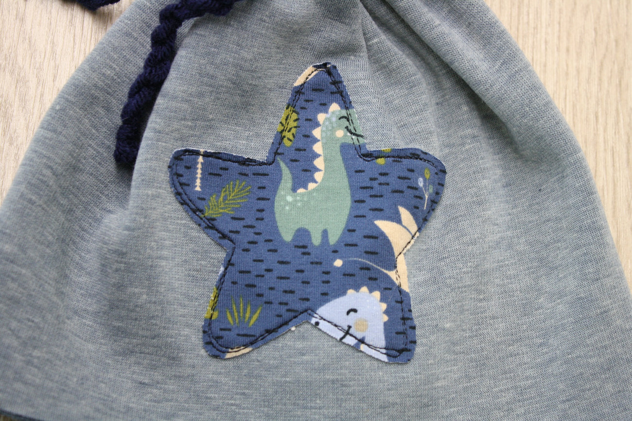 Berretto in felpa pelosa avio con fiocchetto blu - stella dinosauri -  T 6-9 mesi