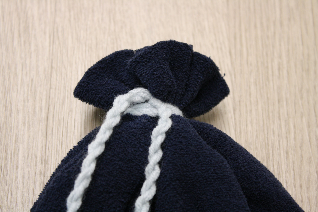 Berretto in felpa boucle blu con fiocchetto - stella