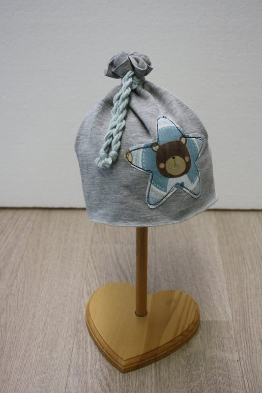 Berretto in felpa mezza stagione grigia con fiocchetto - stella a fantasia orsotto