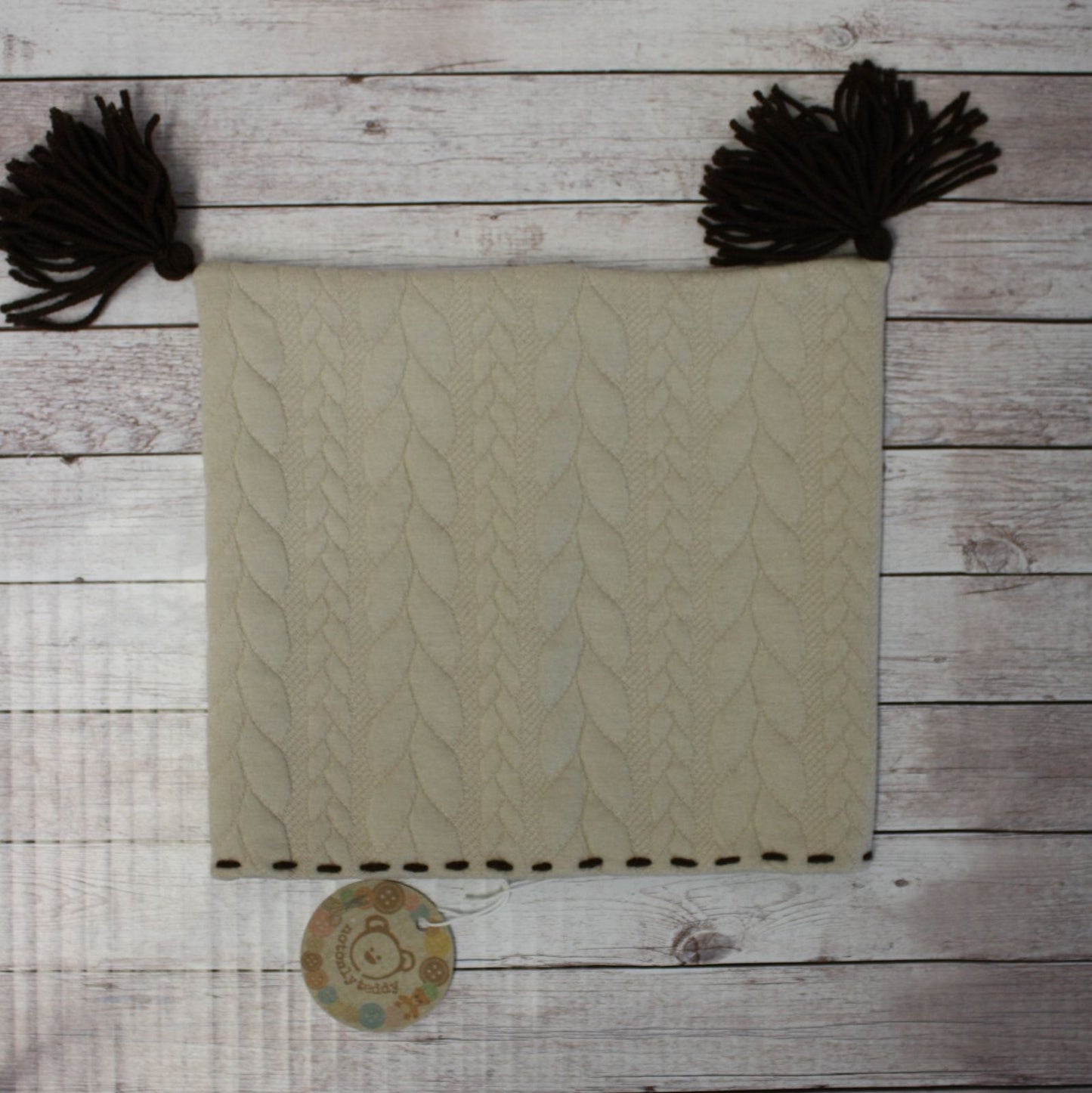 Berretto in jersey knit beige con nappine e bordino marroni - 9-12 mesi