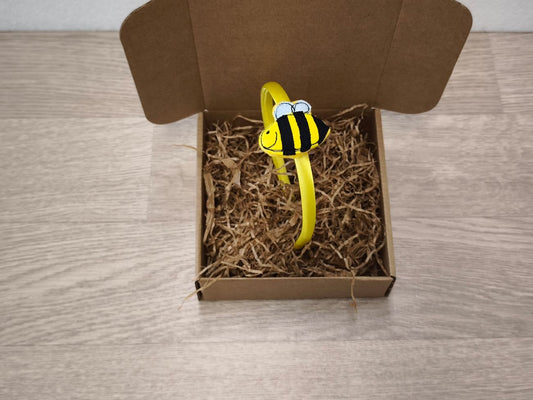 Cerchietto in raso giallo con apetta