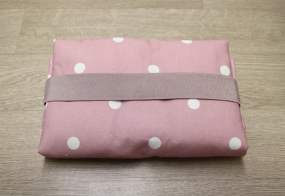 Fasciatoio da viaggio pieghevole con portapannolini – Rosa pois – interno bianco